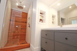 Shower, hair dryer, towels, shampoo