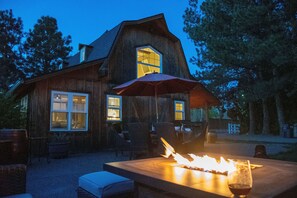 A rustic wooden house with a fire pit and outdoor seating. - The Barn on Braden, Classic Splendor on the South Side (Walla Walla)