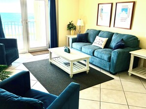 Flat-screen TV, DVD player, books, video library