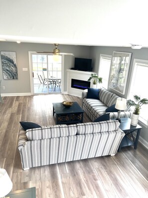 TV, fireplace, DVD player, video library - Chic & Spacious Vacation Home.Community Pool, Modern Amenities & Serene Vibes  (Rehoboth Beach)