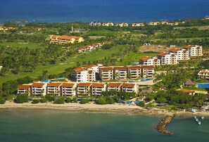 A resort with multiple buildings, a golf course, and a beach. - FRONT ROW PENTHOUSE - Amazing views -  Premier/Cook/Golf Cart (Punta De Mita)