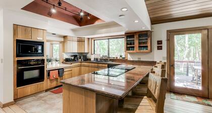 A river runs through. Private Estate on OAK CREEK! Pickleball Court in backyard!