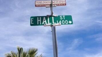 Street signs for Tomlinson Estates Historic District and E Hall St.