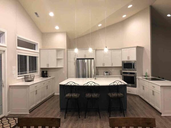 Coffee/tea maker, fridge, microwave, oven