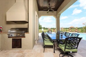 Outdoor dining - Every Amenity! 2 Theaters, Private Gym, Pool, Baby Equip FREE, Outdoor Grill  (Kissimmee)