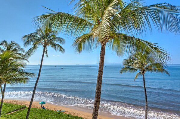 On the beach, sun-loungers, beach towels