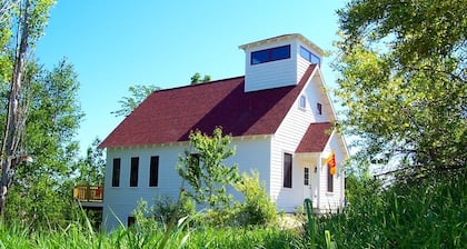 Schoolhouse-Style Lakefront Near Crystal Mountain with Kayaks and Game Room