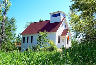 Schoolhouse-Style Lakefront Near Crystal Mountain with Kayaks and Game Room
