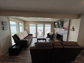 Smart TV, fireplace, DVD player, books