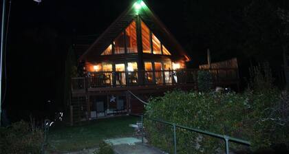 Rent a log home on a private peninsula on Northwood Lake. Enjoy Paradise!