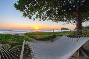 On the beach, sun loungers, beach towels