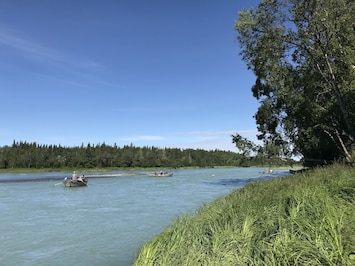 Boats passing by on the Kasilof River