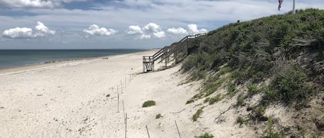 Plage, chaises longues