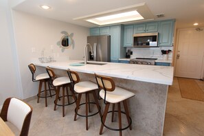 Fridge, microwave, oven, stovetop - Seas Life's Moments - Condo 202: Spacious 2BR retreat in South Padre Island, sleeps 7. (South Padre Island)