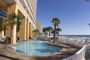 A heated pool, pool loungers