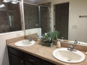 Shower, hair dryer, towels, soap