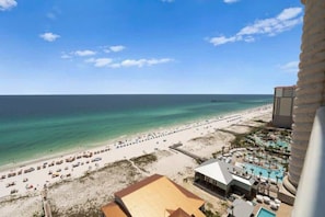 On the beach, sun loungers, beach towels