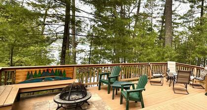 Lakeside Cottage in the Pines with Huge Deck, 40-foot Dock, and Sunset Views