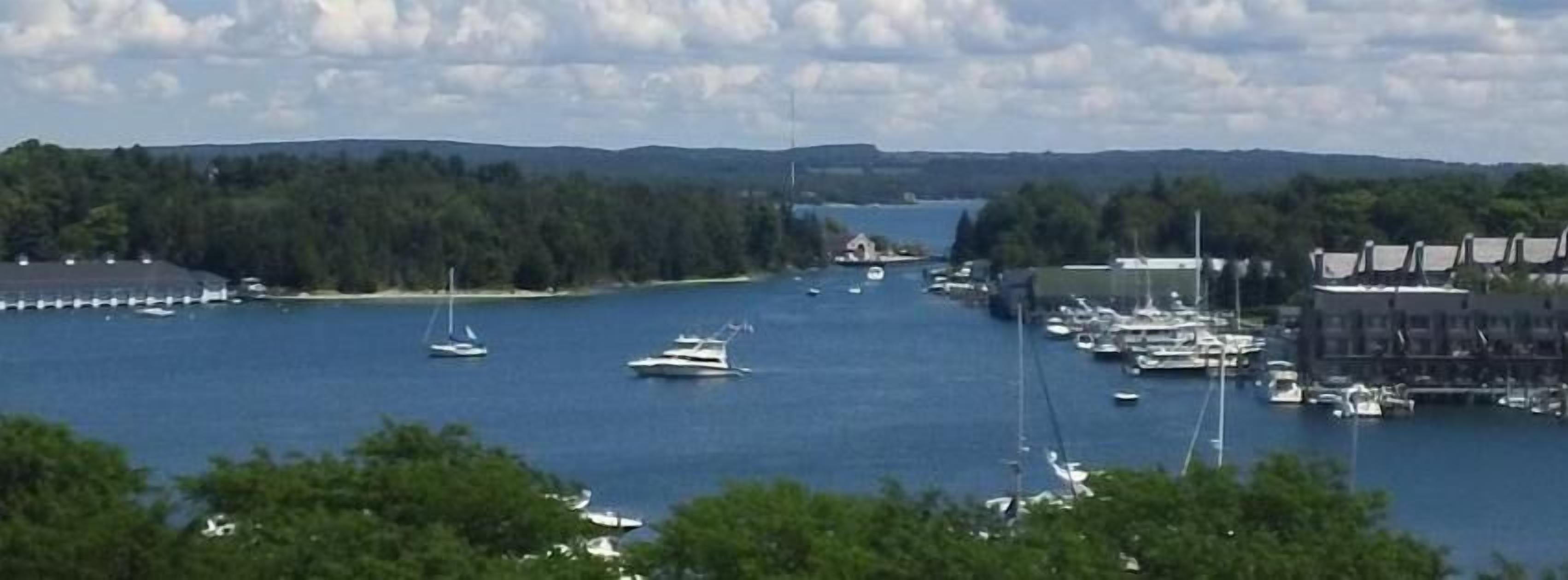 View of Charlevoix located on Round Lake. Lake Charlevoix is in the distance.