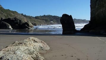 On the beach, sun loungers, beach towels
