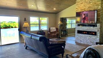 Smart TV, fireplace, DVD player, books