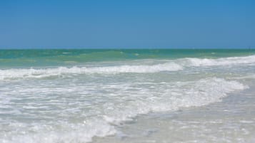 On the beach, sun loungers, beach towels