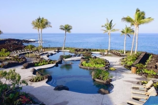 Guests enjoy our awesome Ocean Club with tiered pool, views & restaurant & bar!