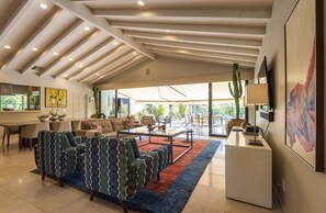 Smart TV, fireplace, books, printers