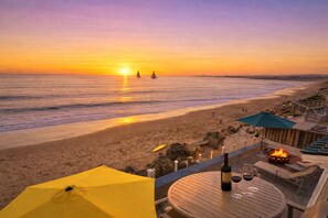 On the beach, sun-loungers, beach towels