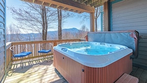 A hot tub on a wooden deck with a view of mountains. - Townhome R21A-Mtn Home, Mtn View, Private Hot Tub, Indoor/Outdoor Pool & Hot Tub (Banner Elk)