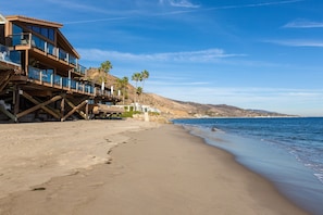 On the beach, sun loungers, beach towels