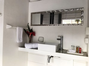 Shower, designer toiletries, towels, soap