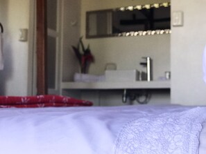 Deluxe Room, 1 King Bed, Non Smoking, Pool View | Egyptian cotton sheets, premium bedding, down comforters, minibar - Ballena Dorada Hotel Boutique (Bahía Ballena)
