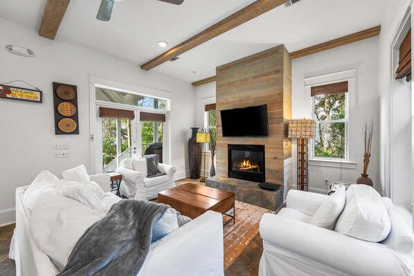 Smart TV, fireplace, table football, books