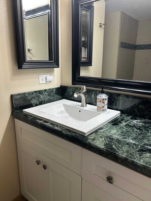 Hair dryer, towels, soap, shampoo