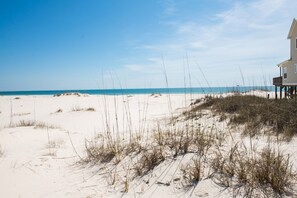On the beach, sun-loungers
