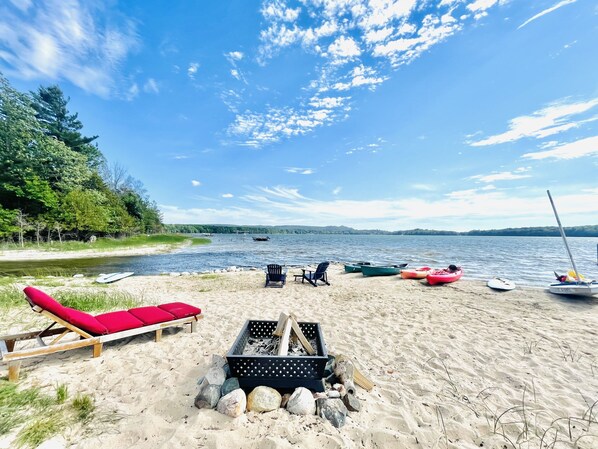 On the beach, sun-loungers
