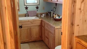 Combined shower/tub, hair dryer, towels, soap