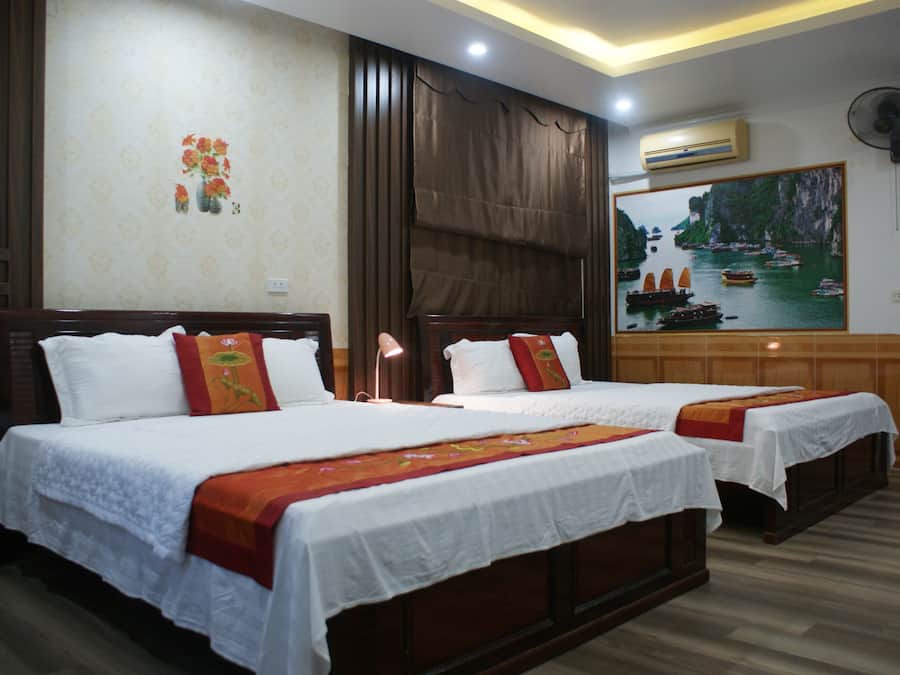 Deluxe Quadruple Room | Desk, blackout drapes, free WiFi, bed sheets