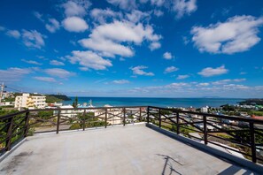 Enjoy breathtaking views of the city and sea from this rooftop terrace.