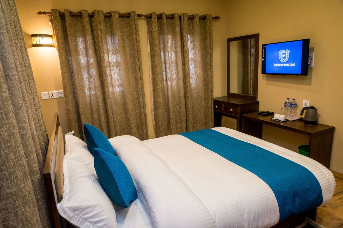 Premium bedding, memory foam beds, desk, blackout drapes