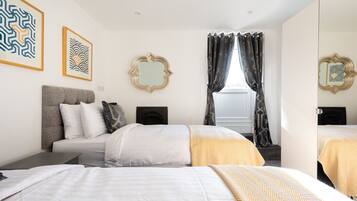 4 habitaciones, tabla de planchar con plancha y wifi gratis