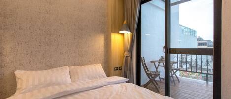 Desk, blackout drapes, soundproofing, rollaway beds