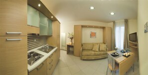 Apartment, 2 Bedrooms, Balcony, Garden View | Living room | Flat-screen TV - Hotel & Residence Continental (Gabicce Mare)