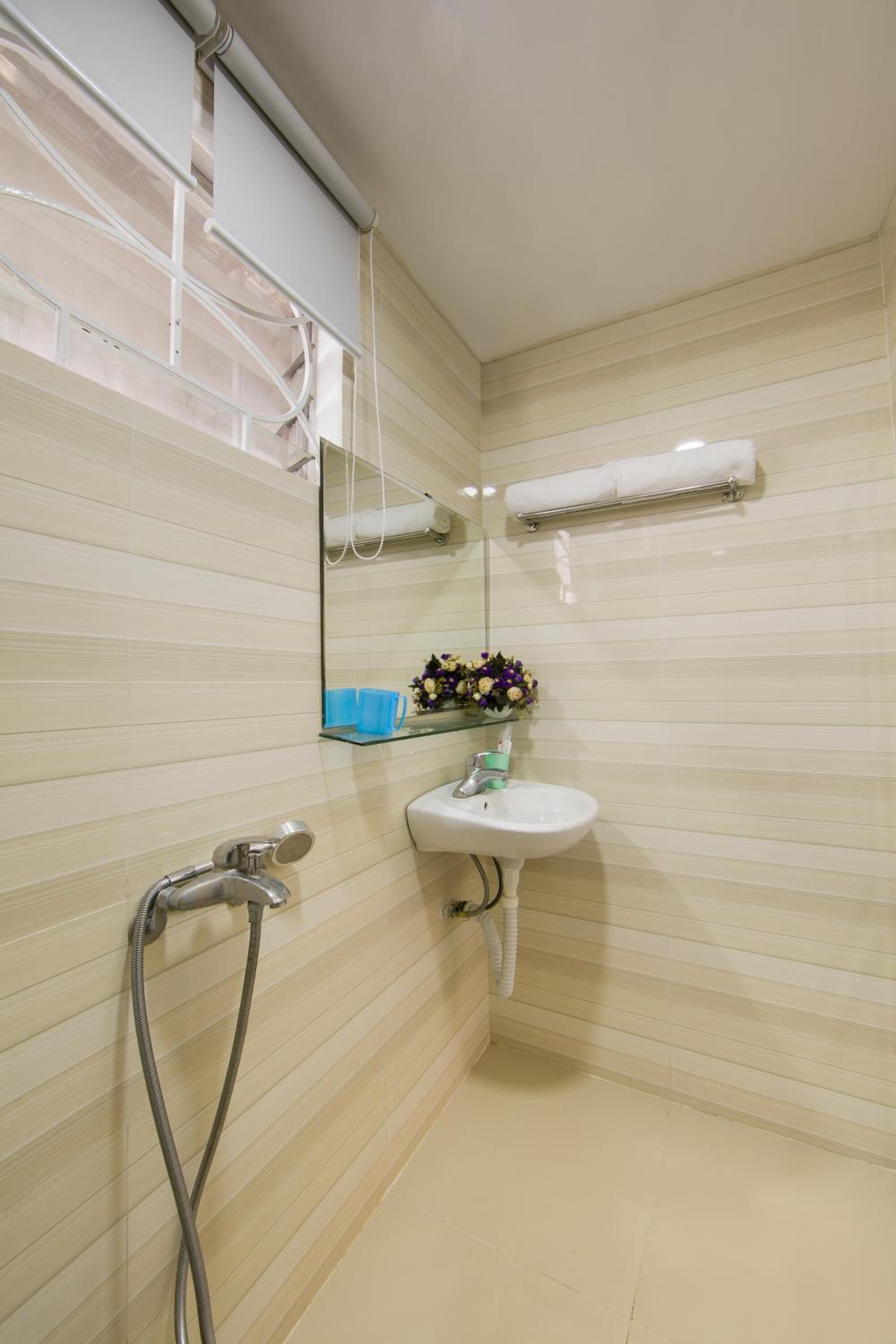 Shower, free toiletries, hair dryer, slippers