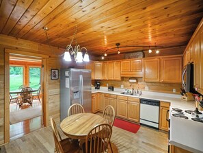 Dishwasher, coffee/tea maker, cookware/dishes/utensils, dining tables