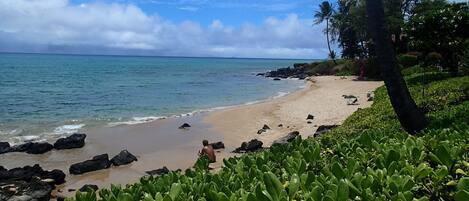 On the beach, sun loungers, beach towels