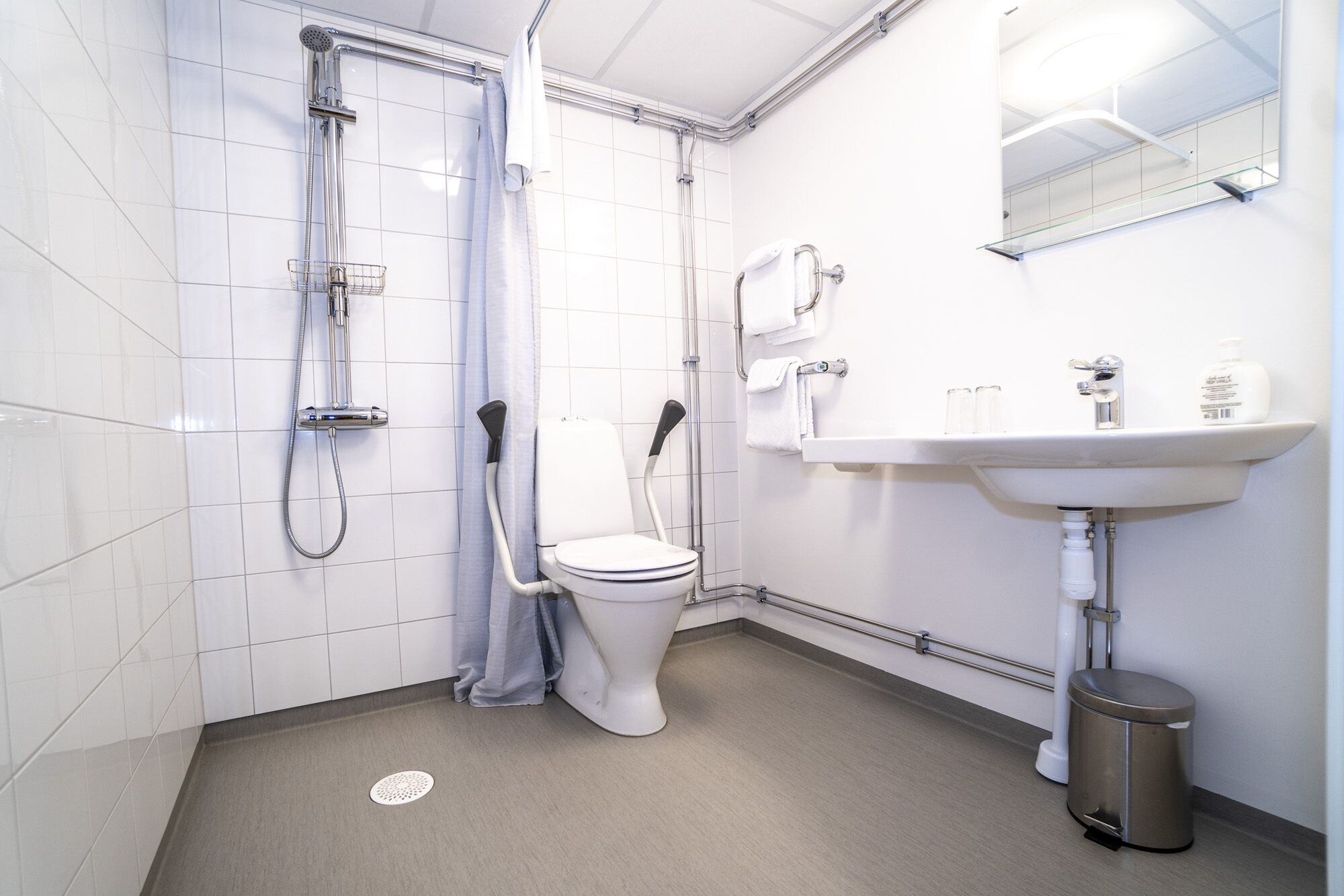 basic double or twin room | bathroom | shower, towels, soap, toilet paper