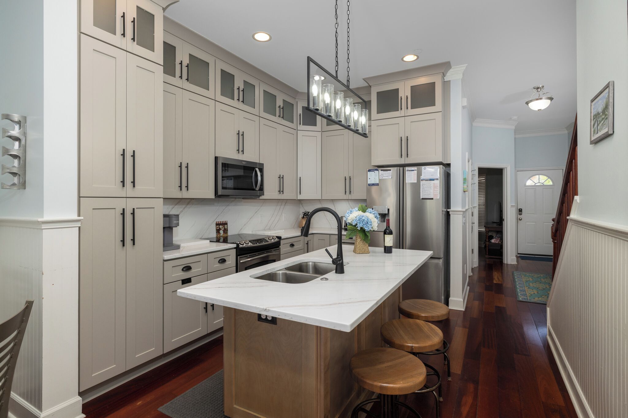 Fridge, dishwasher, coffee/tea maker, cookware/dishes/utensils
