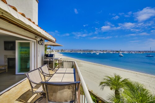 Right On The Beach! Exquisitely Remodeled 3BR/3BA . Perfect For Families.
